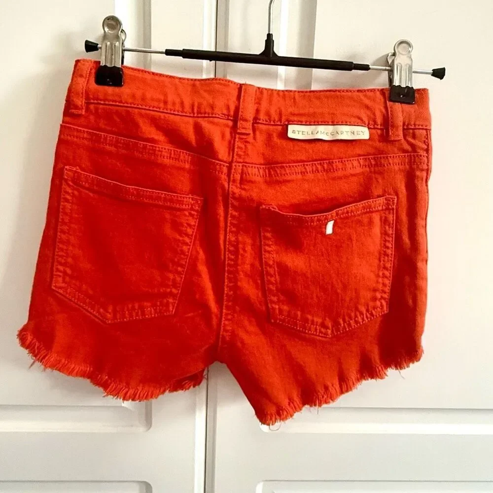 NWT Stella McCartney Kids denim shorts,in orange Size 6